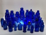 (10J) ANTIQUE COBALT BLUE MEDICINE BOTTLE COLLECTION. TALLEST IS 6.5 INCHES