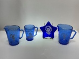 (2B) COBALT BLUE GLASS SHIRLEY TEMPLE CREAM PITCHERS (4 & 4.5 INCHES) AND GLASS STAR PAPER WEIGHT