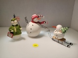 PAIR OF VINTAGE SANDI GORE EVANS OF MIDWEST CANNON FALLS EVAN SNOWMEN ON SLED AND ARMY SNOWMAN 