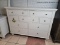 (R1) ASPENHOME CAMBRIDGE 9 DRAWER DRESSER IN WHITE. RETAILS FOR $830 ONLINE! MEASURES 58 IN X 18.5