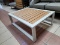 (R2) POLISHED RESIN WOOD SLICKS UP THE CLASSIC COFFEE TABLE STANDARD WITH THIS MODERN APPROACH. MADE