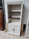 ASPENHOME WESTLAKE DOOR BOOKCASE IN AGED IVORY. RETAILS FOR $899 ONLINE! MEASURES 32 IN X 15 IN X 76