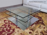 (LR) THE FUJI GLASS MODERN COFFEE TABLE IS A GREAT WAY TO MODERNIZE YOUR HOME. WITH THIS TABLE YOU