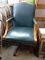 (GARAGE) GREEN FAUX LEATHER AND BRASS STUDDED MAPLE DESK CHAIR- 24 IN X 24 IN X 40 IN, ITEM IS SOLD