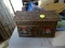 (GARAGE) CAST IRON LOG CABIN BANK WITH CONTENTS- 9 IN X 5 IN X 7 IN, ITEM IS SOLD AS IS, WHERE IS,