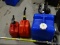 (GARAGE) THREE GAS CANS. ITEM IS SOLD AS IS, WHERE IS, WITH NO GUARANTEE OR WARRANTY. NO REFUNDS OR