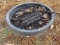 (OUTSIDE BACK) METAL FIRE RING- 34 IN DIA X 6 IN, ITEM IS SOLD AS IS, WHERE IS, WITH NO GUARANTEE OR