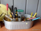 (SHED) GALVANIZED CONTAINER OF SAND WITH GARDENING TOOLS, ITEM IS SOLD AS IS, WHERE IS, WITH NO