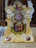 (GARAGE) PORCELAIN WIND UP MANTEL CLOCK- 13 IN X 6 IN X 16 IN, ITEM IS SOLD AS IS, WHERE IS, WITH NO