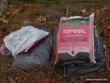 (OUTSIDE) 4 BAGS OF MULCH AND A BAG OF TOPSOIL, ITEM IS SOLD AS IS, WHERE IS, WITH NO GUARANTEE OR