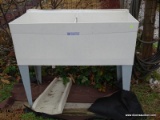 (OUTSIDE-BACK) DOUBLE FIBERGLASS SINK- 40 IN X 24 IN X 33 IN AND INCLUDES A GARDEN HOSE- ITEM IS