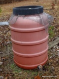 (OUTSIDE BACK) WATER BARREL- 22 IN DIA X 36 IN, ITEM IS SOLD AS IS, WHERE IS, WITH NO GUARANTEE OR