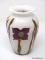 Opaque White vase having a flaring silver rimed lip with imbedded decoration of brown & green leaves