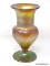 Gold iridescent Tiffany vase with flared opening, smooth neck and ribbed bottom. Green Lustre on the