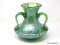 3 handled squatted vase with ribbed, tadpole-like applied handles. Green with aqua iridescent