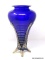Cobalt blue clear footed tapered vase with clear threaded applied glass. Signed 