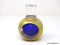 Paperweight perfume bottle, cobalt blue interior, luster gold exterior. Polished clear to triangular
