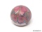 Rose & green colored ball shaped paperweight decorated with heavy feathering creating intricate 3