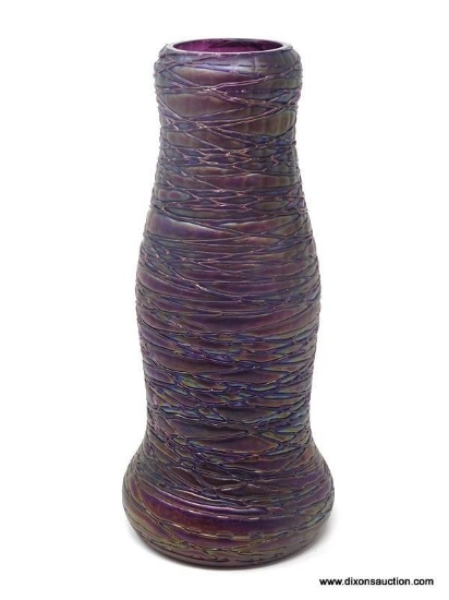 Amethyst colored, iridescent rimless vase. Internally ribbed base with heavily threaded exterior.
