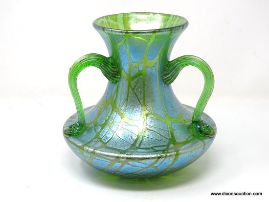 3 handled squatted vase with ribbed, tadpole-like applied handles. Green with aqua iridescent