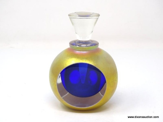 Paperweight perfume bottle, cobalt blue interior, luster gold exterior. Polished clear to triangular