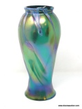 Large, beautifully iridescent twisted emerald green translucent vase with blue 