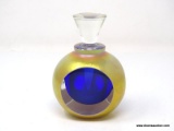 Paperweight perfume bottle, cobalt blue interior, luster gold exterior. Polished clear to triangular