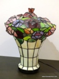 Slagged Glass Rose Bouquet Style Lamp With Liftable Top. Primary Colors Include Red, Cream, And