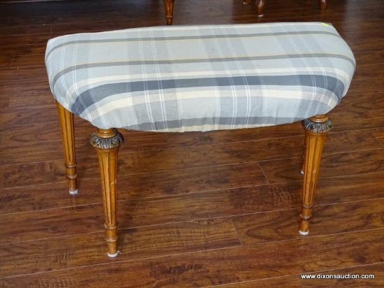 BED BENCH WITH MATCHING GRAY UPHOLSTERY TO THE VANITY CHAIR IN LOT 5. ITEM IS SOLD AS IS WHERE IS