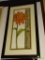 (BWALL) FRAMED FLORAL PRINT IN HUES OF RED, GREEN, AND WHITE. MEASURES APPROXIMATELY 18 IN X 41 IN.