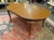 (R2) MAHOGANY QUEEN ANNE DINING TABLE. HAS ROOM FOR LEAVES. MEASURES APPROXIMATELY 71 IN X 44 IN X