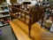 (R2) VINTAGE MAHOGANY BABY CRIB ON CASTORS. MEASURES APPROXIMATELY 52 IN X 29 IN X 36 IN. ITEM IS