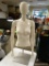 (R2) FEMALE MANNEQUIN TOP HALF ON STAND. MEASURES APPROXIMATELY 40 IN TALL. ITEM IS SOLD AS IS WHERE