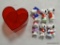 (R2) BAG LOT CONTAINING ASSORTED SNOOPY VALENTINES FIGURINES AND A HEART SHAPED CONTAINER. ITEM IS