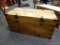 (R2) DOVETAILED AND BRASS ACCENTED CHEST WITH HANDLES. MEASURES APPROXIMATELY 41 IN X 21 IN X 20 IN.