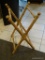 (R3) FOLDING WOODEN STAND. POSSIBLY FOR LUGGAGE. ITEM IS SOLD AS IS WHERE IS WITH NO GUARANTEE OR