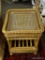 (R3) WICKER AND GLASS TOP END TABLE. MEASURES 19 IN X 21 IN X 20 IN. ITEM IS SOLD AS IS WHERE IS