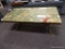 (R3) MARBLE AND GOLD PAINTED IRON BASE COFFEE TABLE. MEASURES 47 IN X 24 IN X 18 IN. ITEM IS SOLD AS