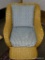(R3) WICKER ARM CHAIR WITH BLUE STRIPE UPHOLSTERED CUSHIONS. IS 1 OF A PAIR. MEASURES 29 IN X 36 IN