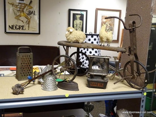 (R2) SHELF LOT OF ASSORTED ITEMS TO INCLUDE A CAST IRON #2 SAD IRON, A VINTAGE CHEESE GRATER, A