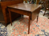 (R2) PINE DROP-LEAF TABLE. MEASURES 35 IN X 34 IN X 40 IN. ITEM IS SOLD AS IS WHERE IS WITH NO