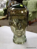 (R2) GLASS WIG/HAT STAND IN THE FORM OF A HEAD. ITEM IS SOLD AS IS WHERE IS WITH NO GUARANTEE OR