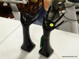 (R2) PAIR OF CERAMIC HANDS IN BLACK. ITEM IS SOLD AS IS WHERE IS WITH NO GUARANTEE OR WARRANTY. NO