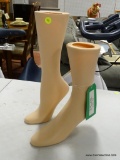 (R2) LOT OF 2 LEG DISPLAYS IN PALE COLOR. ITEM IS SOLD AS IS WHERE IS WITH NO GUARANTEE OR WARRANTY.