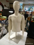 (R2) YOUTH MANNEQUIN TOP HALF ON STAND. MEASURES APPROXIMATELY 34 IN TALL. ITEM IS SOLD AS IS WHERE