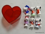(R2) BAG LOT CONTAINING ASSORTED SNOOPY VALENTINES FIGURINES AND A HEART SHAPED CONTAINER. ITEM IS