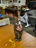 (R2) FLORAL DESIGN TABLE LAMP WITH HARP AND FINIAL. MEASURES 28 IN TALL. ITEM IS SOLD AS IS WHERE IS