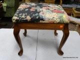 (R2) MAHOGANY QUEEN ANNE FOOTSTOOL WITH FLORAL UPHOLSTERY. MEASURES 19 IN X 16 IN X 18 IN. ITEM IS