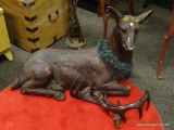 (R2) PLASTER AND FOAM DEER STATUE WITH REMOVABLE ANTLERS. MEASURES APPROXIMATELY 50 IN X 16 IN X 36