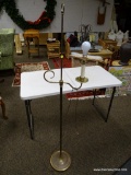 (R2) BRASS FLOOR LAMP. MEASURES 60 IN TALL. ITEM IS SOLD AS IS WHERE IS WITH NO GUARANTEE OR